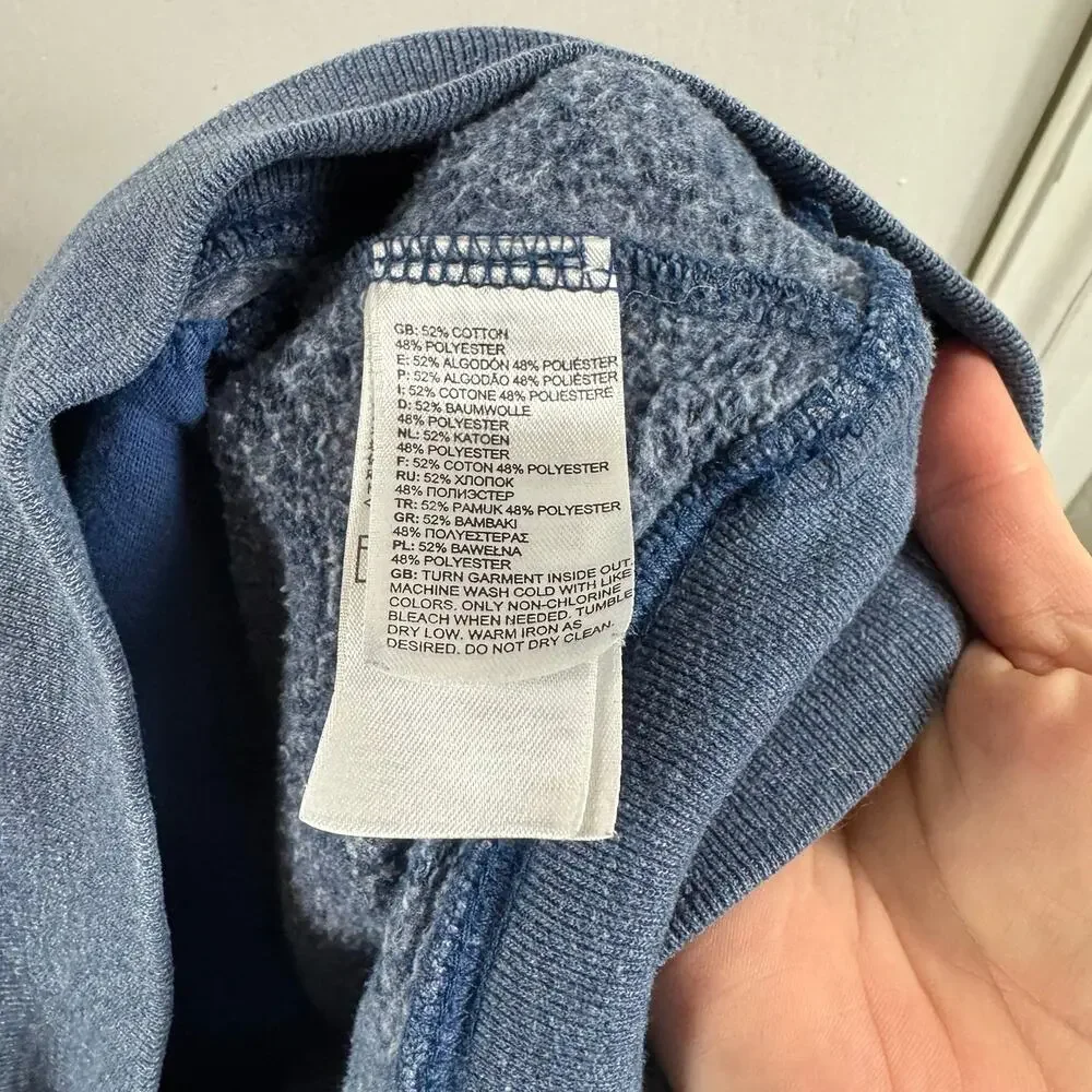The North Face RU14 medium weight light blue graphic hooded sweatshirt
